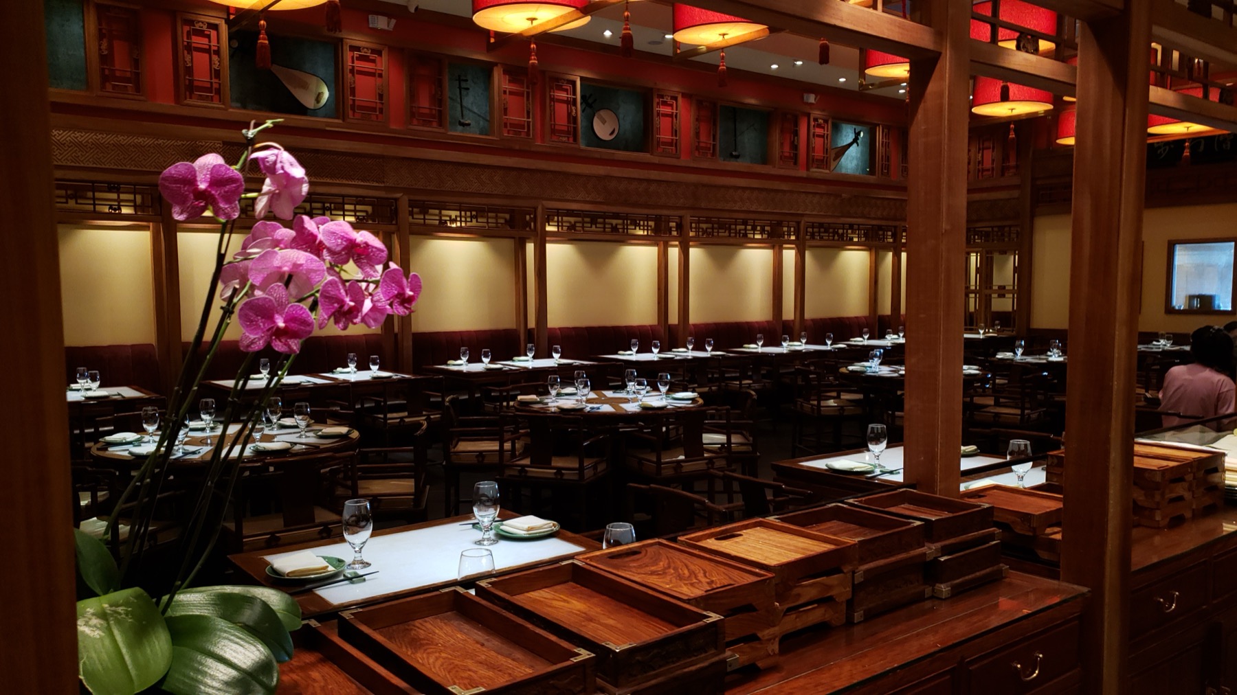A restaurant dining room laid for service